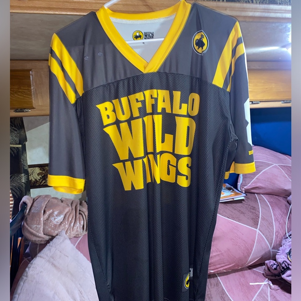 Buffalo Wild Wings jersey;Medium. No stains! Perfect condition.Loose fit/Long.